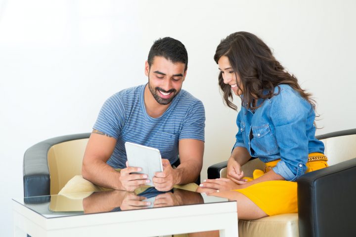 Couple using tablet